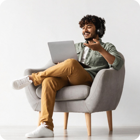 Enterprise learner using Sana Learn on a laptop with headphones